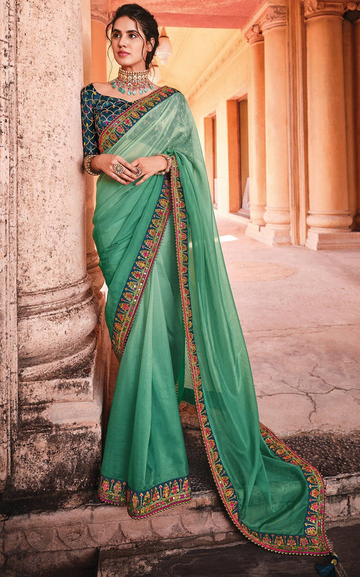 Traditional Designer Party Wear Torquious Satin Saree With Embroidery Border. Apparel & Accessories Roopkashish 