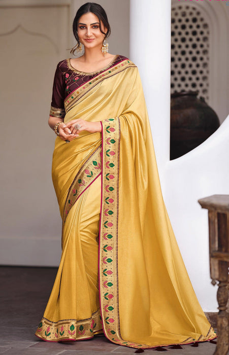 Traditional Designer Party Wear Yellow Color Vichitra Silk Saree With Embroidery Border Tassal Pallu And Wine Color Embroidery Blouse Piece. Apparel & Accessories Roopkashish 